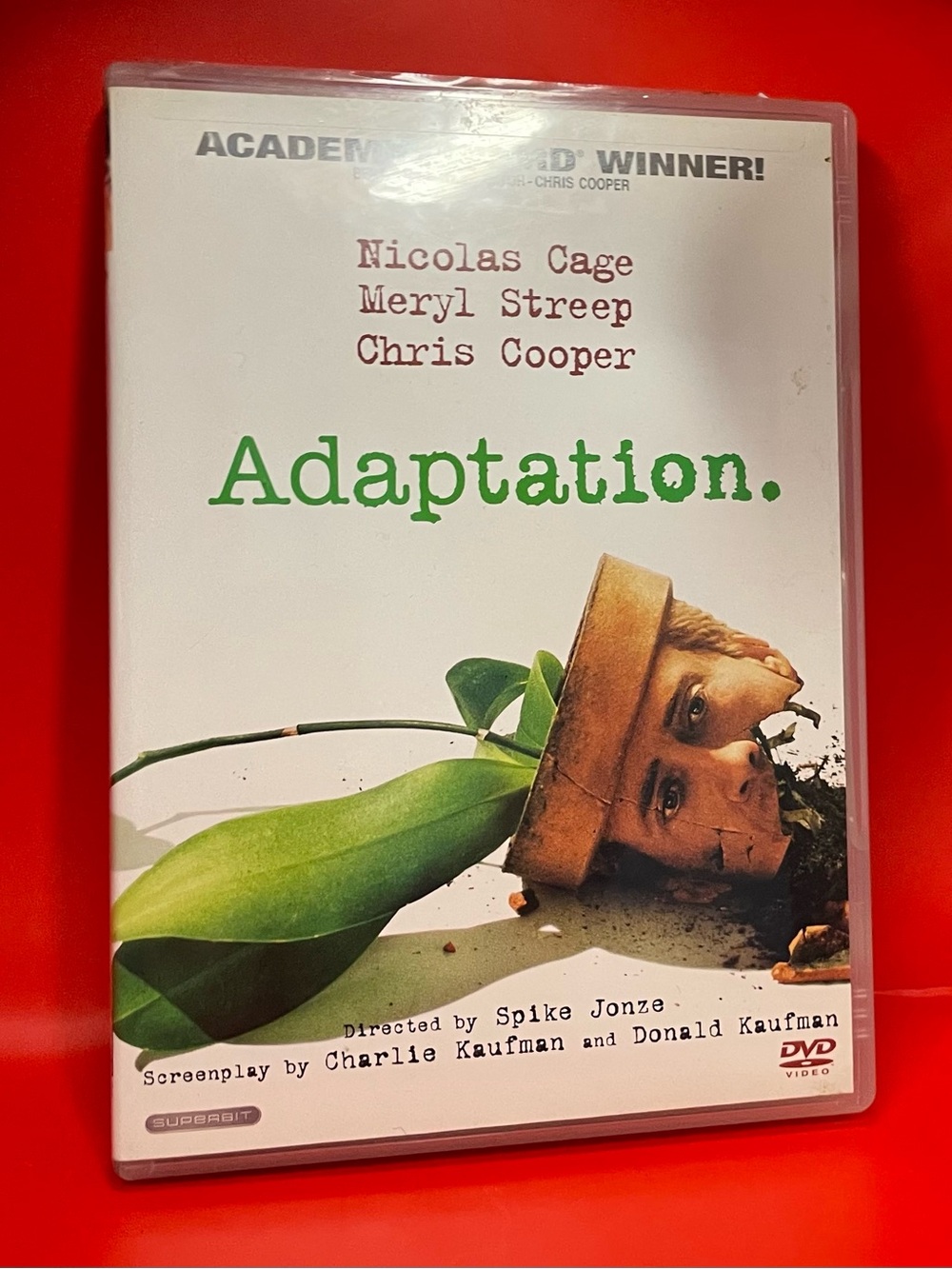 Adaptation. DVD - White/Green Case
